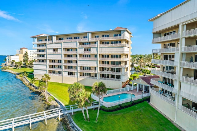 view of building exterior featuring a water view