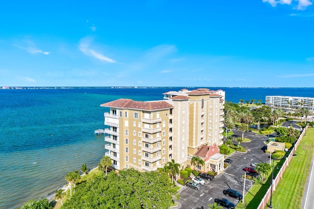 drone / aerial view with a water view