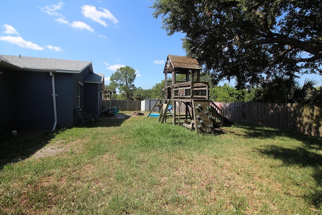 view of yard featuring a playground