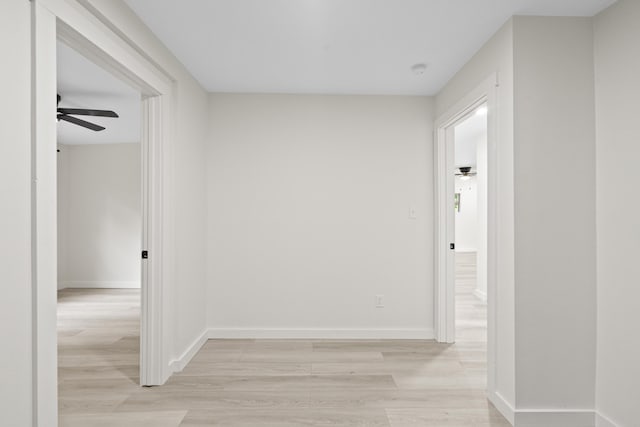 hallway featuring light hardwood / wood-style flooring