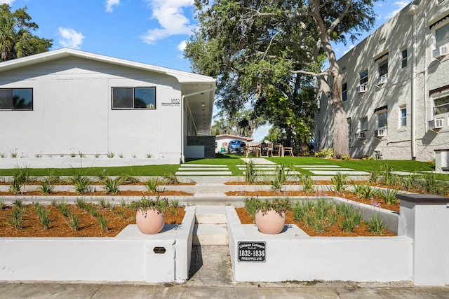 exterior space with a lawn