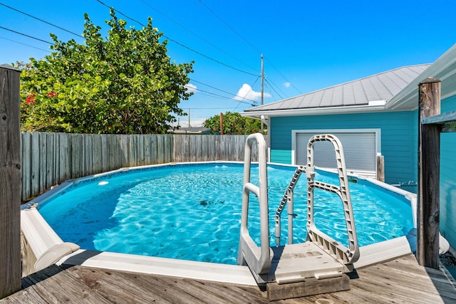 view of pool featuring a wooden deck