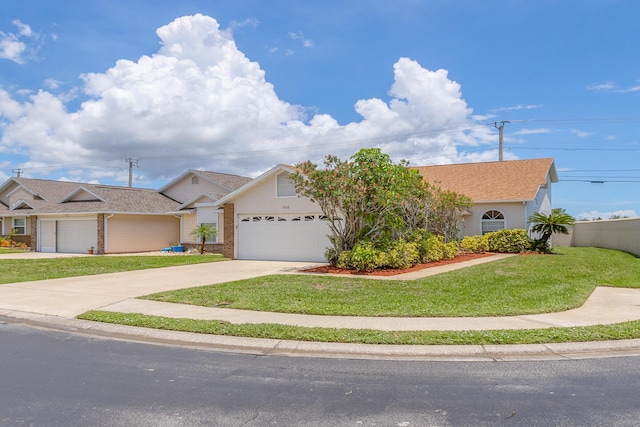 single story home with a front yard and a garage