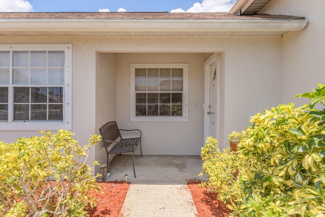 doorway to property featuring a patio