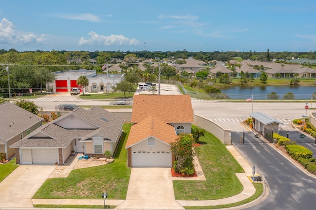 drone / aerial view featuring a water view