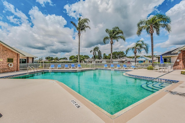 view of swimming pool featuring a patio