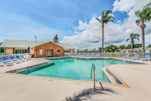 view of swimming pool with a patio