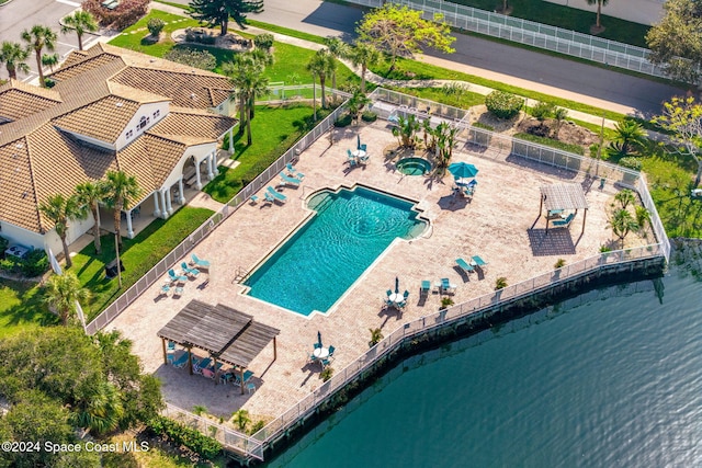 drone / aerial view featuring a water view