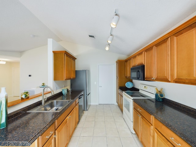 6256 Mirror Lake Ct Unit 6256, Sebastian, FL 32958 - kitchen featuring vaulted ceiling, sink, light tile patterned flooring, and black appliances