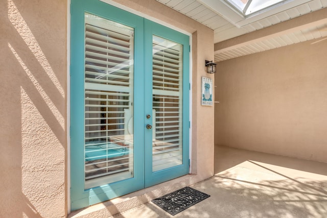 entrance to property featuring french doors