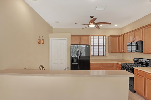 kitchen featuring black appliances, ceiling fan, and light tile patterned floors