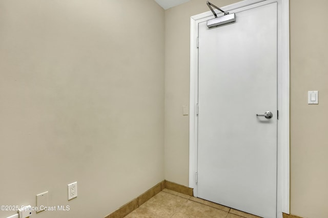 bathroom with tile patterned flooring