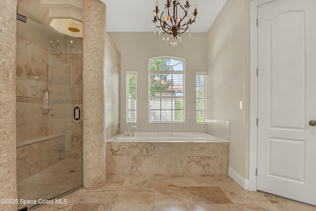 bathroom with separate shower and tub