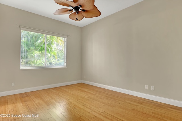 unfurnished room featuring ceiling fan and light wood-type flooring