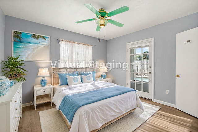 bedroom featuring hardwood / wood-style flooring and ceiling fan