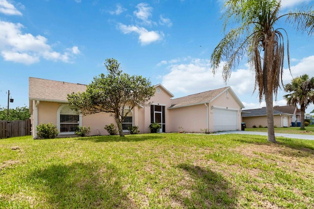 1632 Cains Ave NW, Palm Bay, FL 32907 - ranch-style house featuring a front yard, fence, concrete driveway, an attached garage, and stucco siding