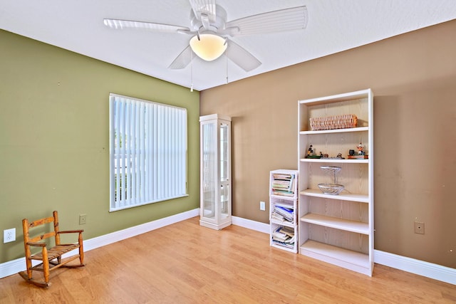 interior space featuring ceiling fan and hardwood / wood-style floors