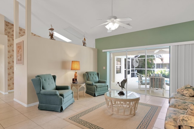 tiled living room with high vaulted ceiling and ceiling fan