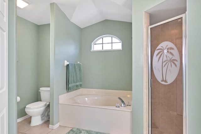 bathroom with tile floors, vaulted ceiling, separate shower and tub, and toilet