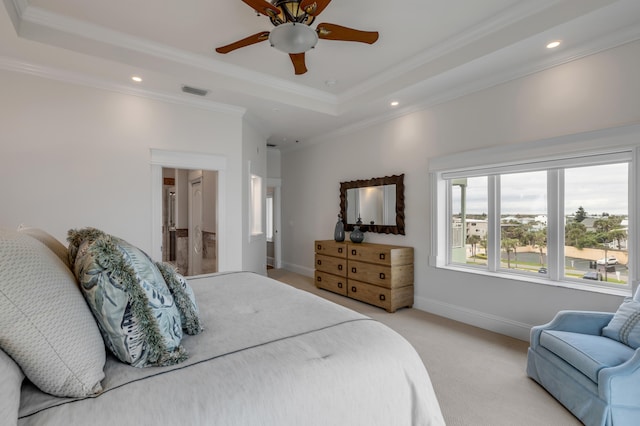 bedroom featuring carpet, a raised ceiling, crown molding, and ceiling fan