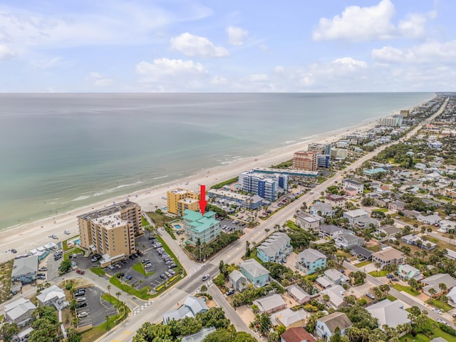 bird's eye view with a view of the beach and a water view