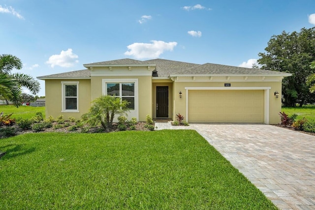 view of front of home featuring a shingled roof, an attached garage, decorative driveway, a front lawn, and stucco siding