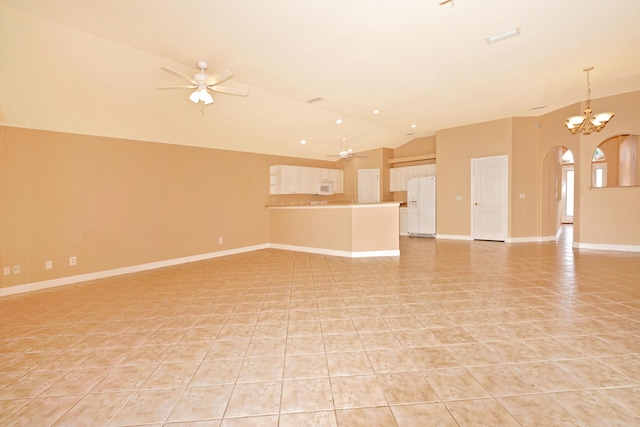 unfurnished living room with light tile patterned flooring, lofted ceiling, and ceiling fan with notable chandelier