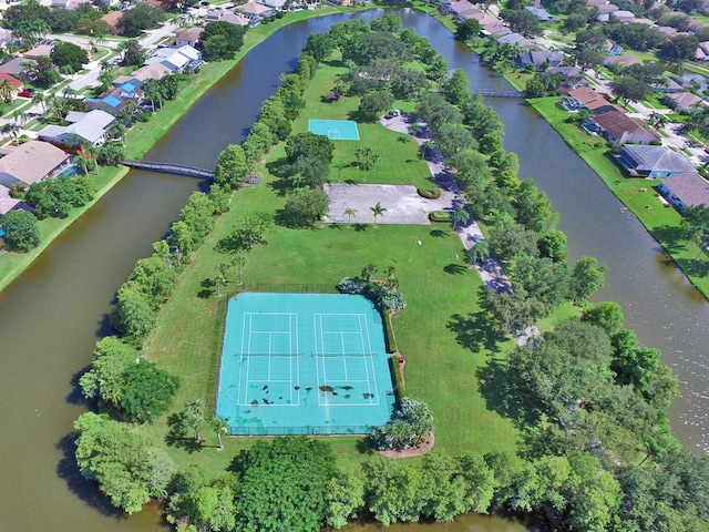 bird's eye view with a water view