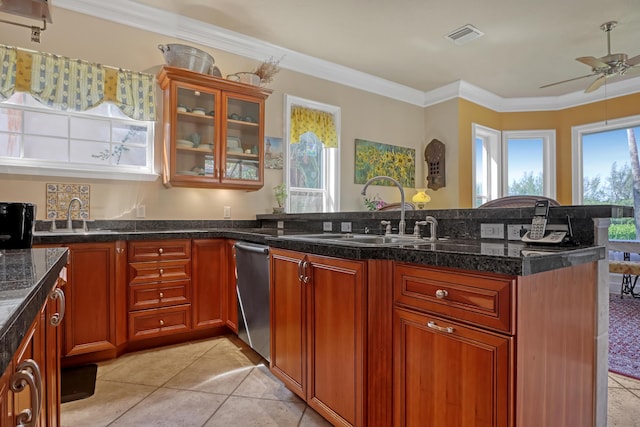 kitchen with ceiling fan, sink, light tile patterned floors, and ornamental molding