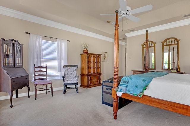 carpeted bedroom featuring ceiling fan and crown molding