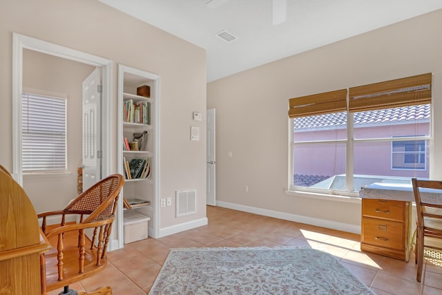 home office with light tile patterned flooring