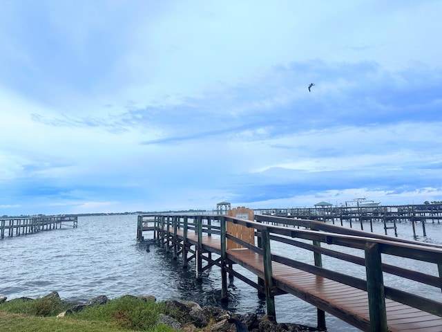 dock area featuring a water view