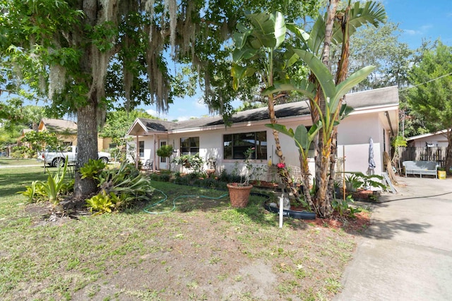 view of front of home with a front yard