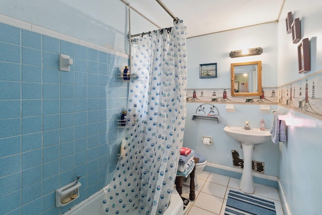 bathroom with tile patterned flooring and sink