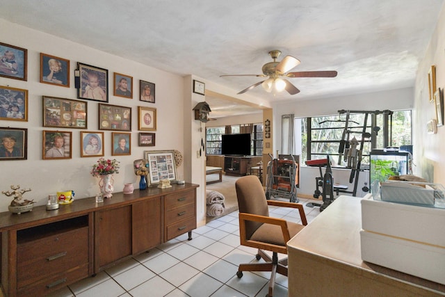 office area featuring light tile patterned flooring and ceiling fan