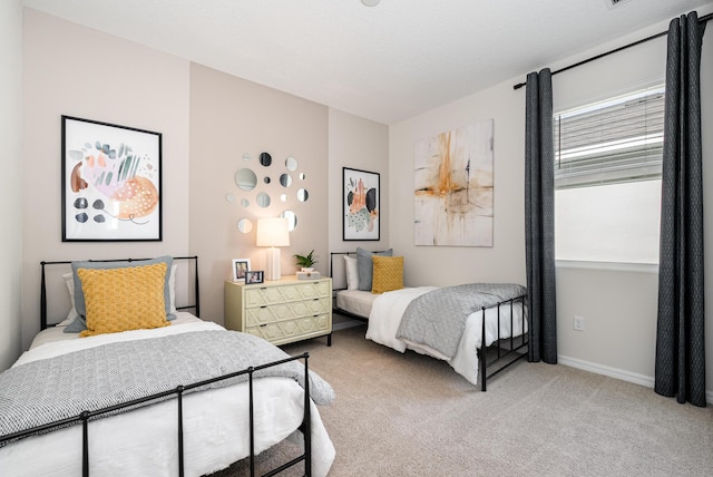 bedroom featuring light colored carpet