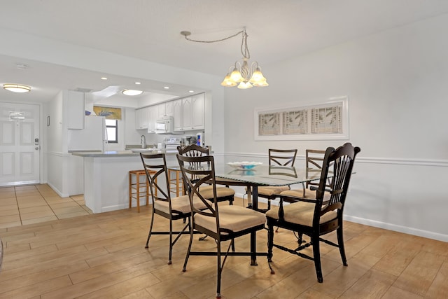 dining room with a chandelier