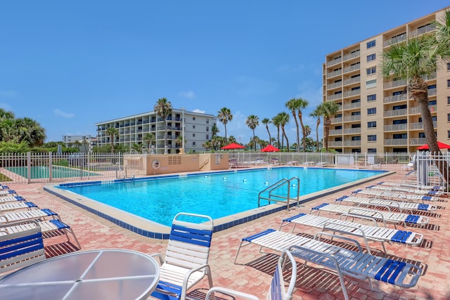 view of pool featuring a patio area