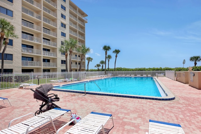 view of pool featuring a patio