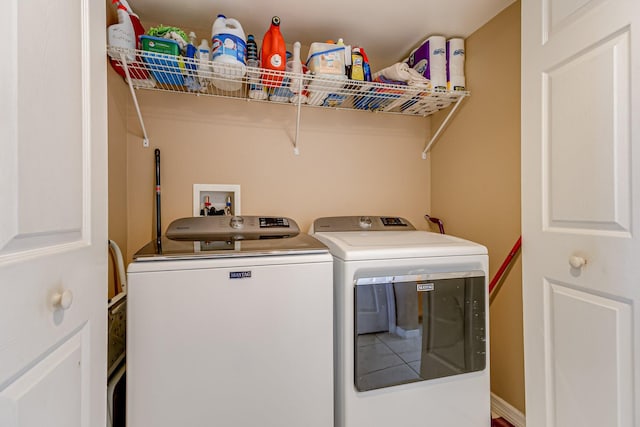 washroom featuring separate washer and dryer