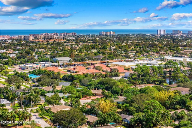 aerial view featuring a view of city and a water view
