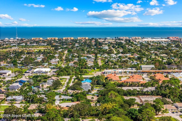 aerial view featuring a water view and a residential view