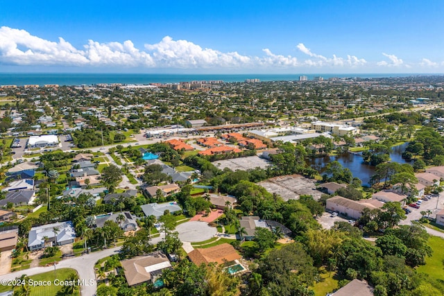 aerial view featuring a water view and a residential view