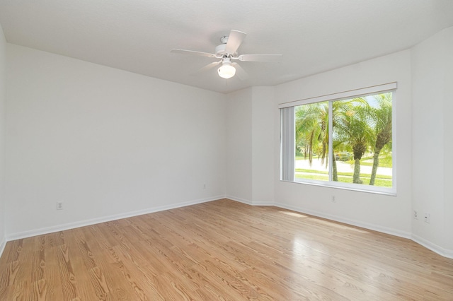 unfurnished room featuring ceiling fan and light hardwood / wood-style floors