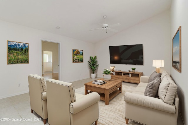 living room with lofted ceiling and ceiling fan