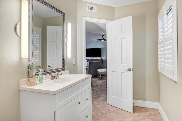 bathroom featuring vanity, tile patterned floors, and ceiling fan