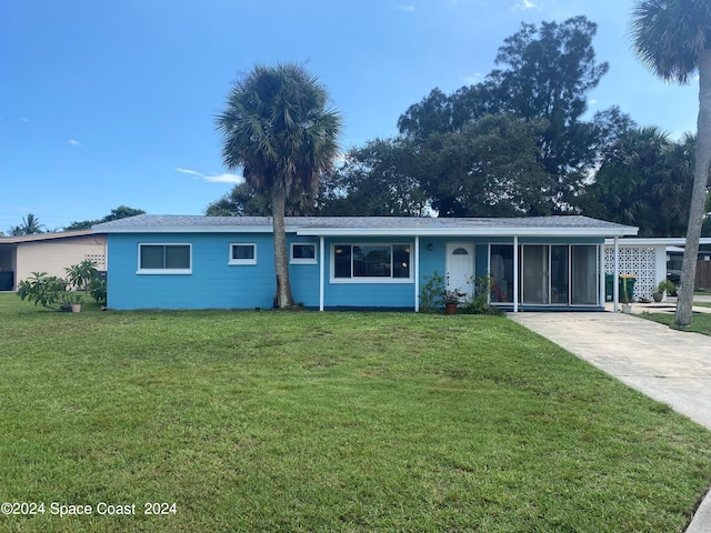 single story home featuring a front yard