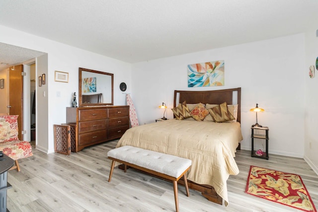 bedroom featuring light hardwood / wood-style flooring