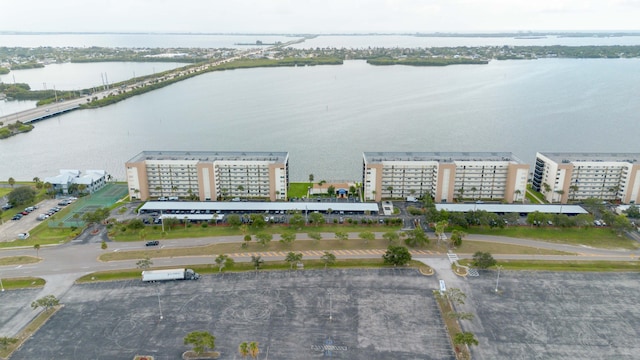 birds eye view of property featuring a water view