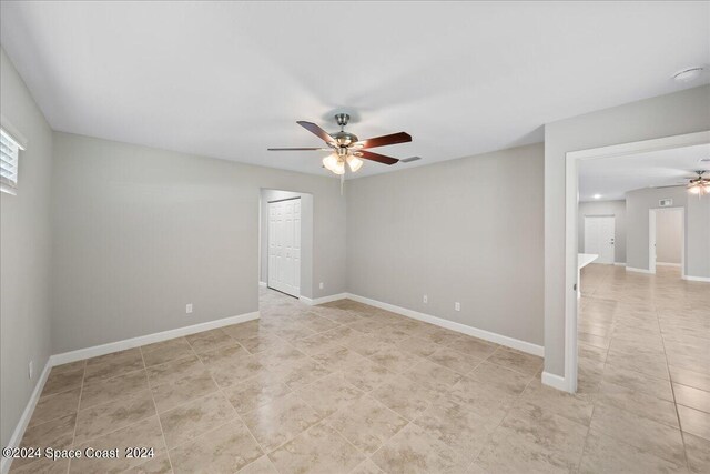 empty room with ceiling fan